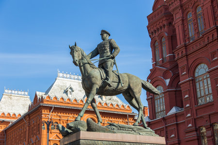 Moscow, Russia- 20 September 2014: Monument of Georgy Zhukov on the horse, Soviet Red Army General. Building of the State Historical Museum in the background.のeditorial素材