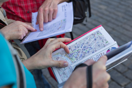 Moscow, Russia- 20 September 2014: Tourists looking for destination on map while traveling together around Moscow.のeditorial素材