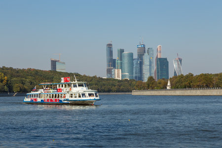 Moscow, Russia- 21 September 2014: View of skyscrapers Moscow International Business Center, Moscow City. Tourist ferry on the Moscow river.のeditorial素材