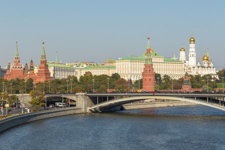 Moscow, Russia- 21 September 2014: View of Kremlin walls with Water Supplying, Borovitskaya towers and the Grand Kremlin Palace. Patriarshiy Bridge in the background.のeditorial素材