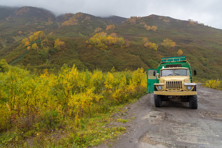 Esso, Kamchatka Peninsula, Russia- 04 October 2014: Russian off-road extreme expedition truck on the way to the Valley of Little Geysers, Eastern Mountains.のeditorial素材