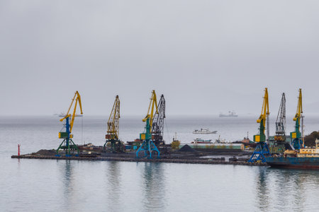 Petropavlovsk-Kamchatsky, Russia- 05 October 2014: View of harbor cranes. Shipyard ans sea port on...
