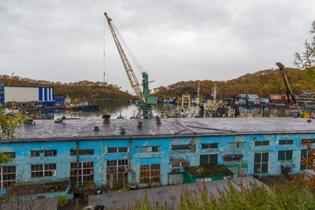 Petropavlovsk-Kamchatsky, Russia- 05 October 2014: View of port and shipyard buildings. Shipyard and...