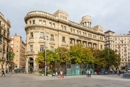 Barcelona, Spain- 09 November 2014: Facades of elegant, historical tenement houses at the Nova Square in the center of the town.のeditorial素材