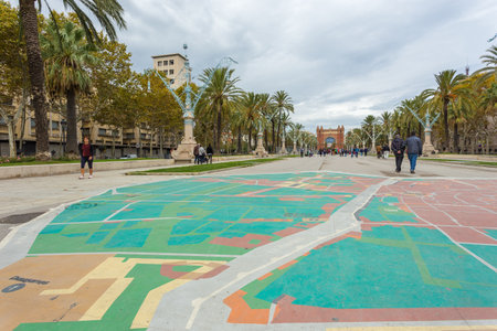 Barcelona, Spain- 09 November 2014: Passeig de Lluis Companys, main promenade. Triumphal arch, Arc...