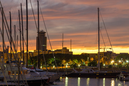 Barcelona, Spain- 09 November 2014: View of the Barcelona Yacht Port. Exclusive yachts moored in the marina at night. South Europe, Mediterranean Sea.のeditorial素材