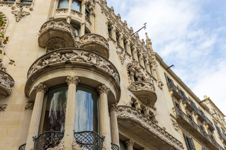 Barcelona, Spain- 10 November 2014: Facade of a modernist building at Passeig de Gracia, Eixample District. Building with rich decorations. New part of the city.のeditorial素材
