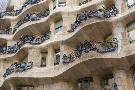 Barcelona, Spain- 10 November 2014: The decorative balcony and facade of a monumental tenement house, Casa Mila, La Pedrera. Important work of Antonio Gaudi at Carrer de Provenca.のeditorial素材