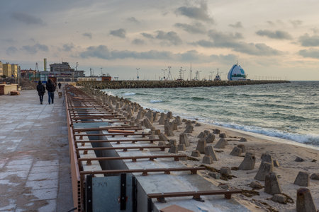 Hel, Poland- 31 January 2015: View of the breakwater and seaport in the city of Hel. Town and Baltic Sea in the background.のeditorial素材