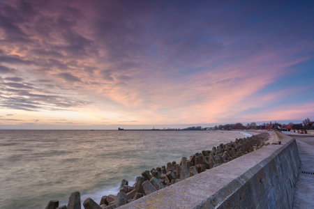 Hel, Poland- 31 January 2015: iew of the breakwater and seaport in the city of Hel. Town and Baltic Sea in the background.のeditorial素材