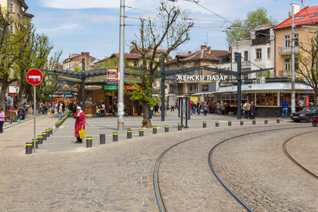 Sofia, Bulgaria- 30 April 2015: Tram tracks on Stefan Stambolov boulevard, around Zhenski Pazar. Historic tenement houses, market place.のeditorial素材