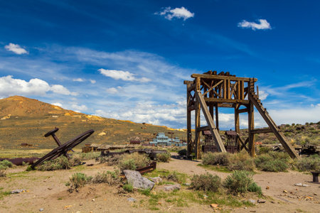 Bodie, California, USA- 03 June 2015: Ghost town, Bodie States Historic Park. Abandoned artifact.Standard Consolidated Mining Company Stamp Mill in the background.のeditorial素材