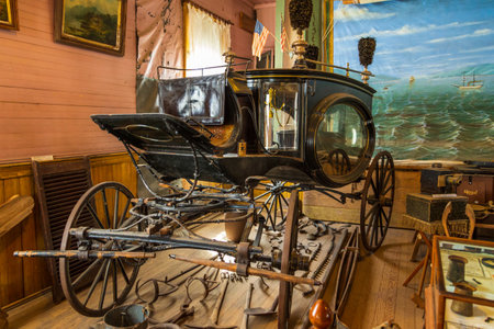 Bodie, California, USA- 03 June 2015: Stagecoach as a museum exhibit in ghost town, Bodie. Bodie State Historic Park.のeditorial素材
