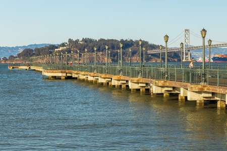 San Francisco, California, USA- 07 June: Wooden pier 7 with decorative lanterns. Walking place for people, Fisherman Wharf.のeditorial素材