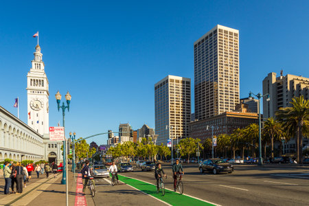 San Francisco, California, USA- 07 June 2015: Skyscrapers along The Embarcadero and San Francisco Ferry Building. Representative promenade at Downtown.のeditorial素材