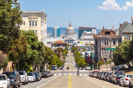 San Francisco, California, USA- 08 June 2015: View of tenements along Fulton Street, traffic jam and car park. Memorial Court in the background.のeditorial素材