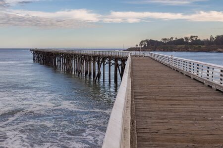 View of the wooden San Simeon pier. Small village on the Pacific Ocean Coast. California, USA.の写真素材