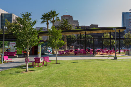 Los Angeles, California, USA- 11 June 2015: View of the Grand Park Playground, Little Tokyo. Pink benches on the lawn.