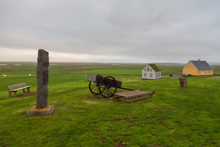 Glaumbaer, Iceland- 25 August 2015: View of the Askaffi Restaurant in the open-air museum. Yellow, wooden building.のeditorial素材