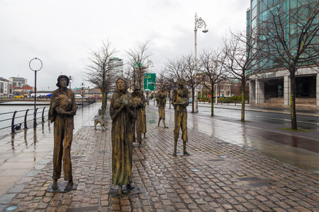 Dublin, Ireland- 09 November 2015: The Famine Memorial, Sculptures dedicated to the Great Famine. On the banks of the River Liffey.のeditorial素材