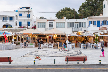 Chora, Ios Island, Greece- 19 September 2020: View of the center of the old port city. Restaurants and shops.のeditorial素材