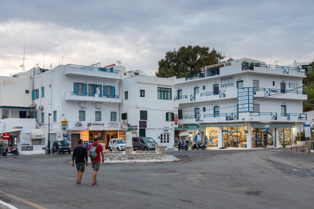 Chora, Ios Island, Greece- 19 September 2020: View of the center of the old port city. Restaurants and shops.のeditorial素材