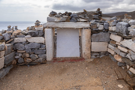 Ios Island, Greece- 20 September 2020: The white tomb of Homer. A legend tells that this famous poet was buried here.のeditorial素材