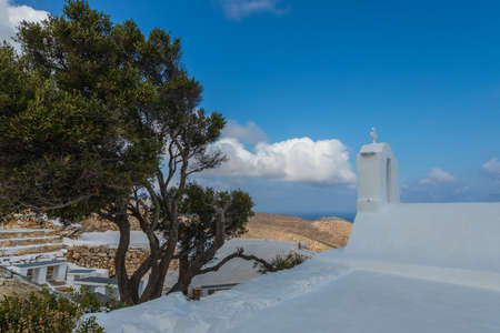 View of the small Church of Panagia Paleokastritsa inside the ruins Palaiokastro castle. Top on the hill. Ios Island, Greece.の写真素材