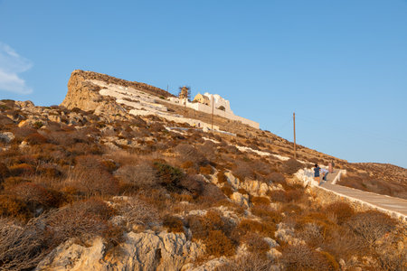 Chora, Folegandros Island, Greece- 23 September 2020: View of the path to the Church of Virgin Mary, of Panaghia at sunset.のeditorial素材