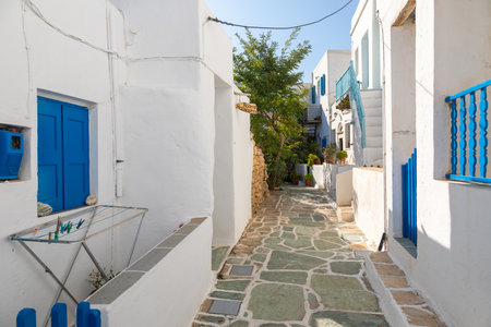Folegandros Island, Greece - 25 September 2020: A narrow side street in Chora, old town. Characteristic Greek buildings.のeditorial素材
