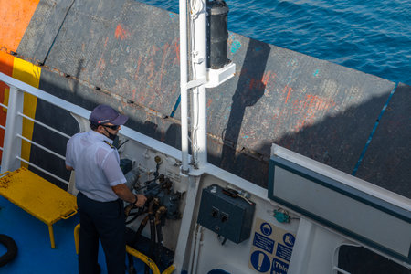 Ferry on board, Cyclades Archipelago, Greece - 26 September 2020: Ferry ship ocean liner worker...