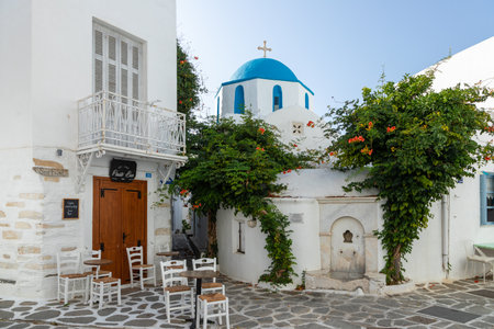 Paikia, Paros Island, Greece - 26 September 2020: View of the orthodox Greek Church, building with blue dome and cross of the top.のeditorial素材