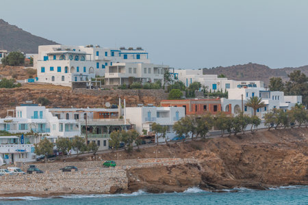 Piso Livadi, Paros Island, Greece - 26 September 2020: View of the port with traditional, white buildings in the evening. Illuminations.のeditorial素材