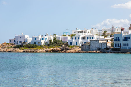 Naoussa, Paros Island, Greece - 27 September 2020: View of the small port town on the island of Paros. White traditional villas with blue shutters.のeditorial素材