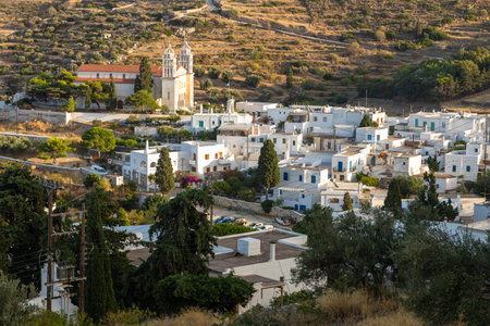 Lefkes, Paros Island, Greece - 27 September 2020: View of the Saint Ioannis Kleidonias in the center of Lefkes. High building against the backdrop of the mountains.のeditorial素材