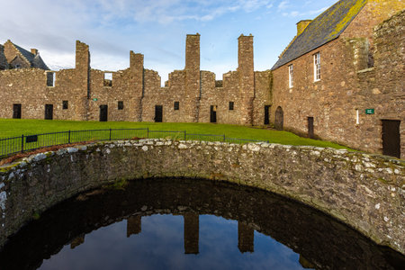 Stonehaven, Aberdeenshire, Scotland, UK - 04 February 2016: View of the ruins courtyard of the 13th century Dunnottar Castle, medieval fortress. Aberdeenshire, Stonehaven, Scotland, United Kingdom.のeditorial素材