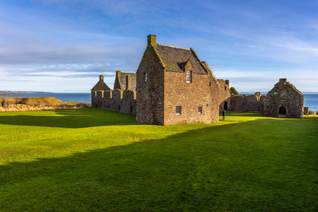 Stonehaven, Aberdeenshire, Scotland, UK - 04 February 2016: View of the ruins courtyard of the 13th century Dunnottar Castle, medieval fortress. Aberdeenshire, Stonehaven, Scotland, United Kingdom.のeditorial素材