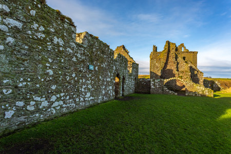 Stonehaven, Aberdeenshire, Scotland, UK - 04 February 2016: View of the ruins courtyard of the 13th century Dunnottar Castle, medieval fortress. Aberdeenshire, Stonehaven, Scotland, United Kingdom.のeditorial素材