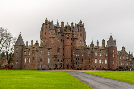 Glamis, Scotland, UK - 04 February 2016: View of Glamis Castle, situated beside the village of Glamis in Angus. It is the home of the Countess of Strathmore and Kinghorne.のeditorial素材