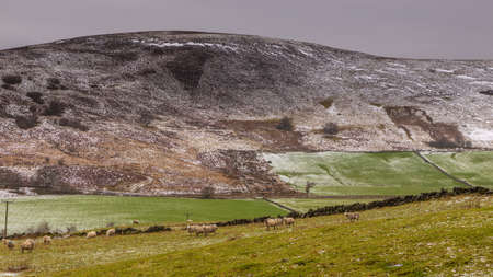 View of the snow-covered hills in Angus. Rural landscape. Aberdeenshire, Scotland, UK.