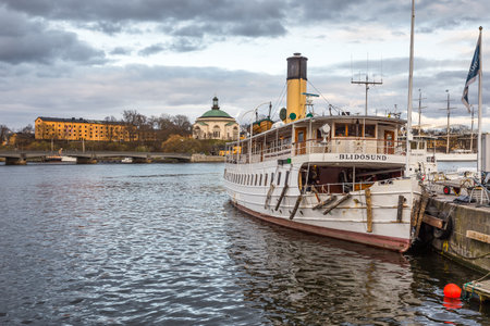 Stockholm, Sweden - April 18, 2016: Ship moored at Riddarholmen Island in Gamla Stan. Center of capital city.のeditorial素材