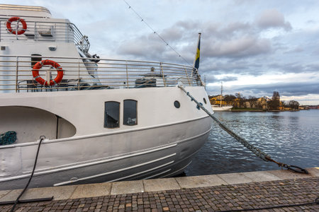 Stockholm, Sweden - April 18, 2016: Ship moored at Riddarholmen Island in Gamla Stan. Center of capital city.のeditorial素材