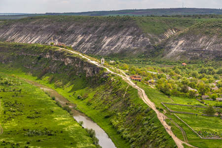 A view of the on St. Mary Church in Reut river valley in Trebujeni, natural landscape of limestone rock. Republic of Moldova.の写真素材
