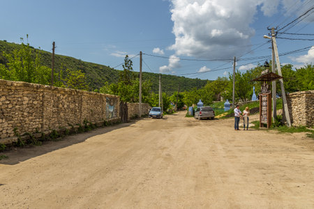 Butuceny, Republic of Moldova -01 May 2016: View of the buildings and the gravel road in the village of Butuceny, located at Orhei National Park.のeditorial素材