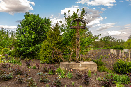 Pripiceni-Curchi, Republic of Moldova - 01 May 2016: View of the Monastery The Holy Great Martyr Dumitru. Wooden cross.のeditorial素材