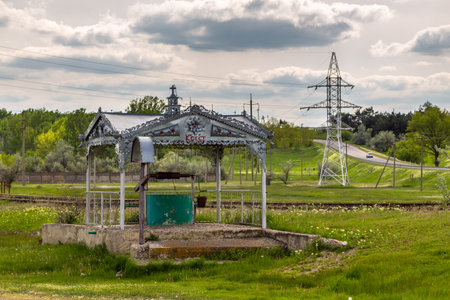 Comrat, Gagauzja, Republic of Moldova - 02 May 2016: Well, a water intake point surrounded by a beautiful, openwork structure.のeditorial素材