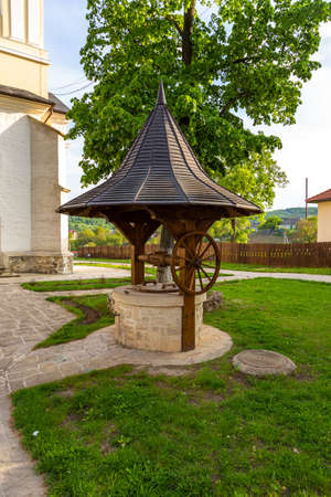 Well casing, water intake point at Capriana monastery, one of the oldest in Moldova. Capriana, Republic of Moldova.の写真素材