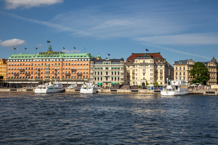 Stockholm, Sweden - 25 June 2016: Ships moored in the port of Gamla Stan, the old historic city of Stockholm.のeditorial素材