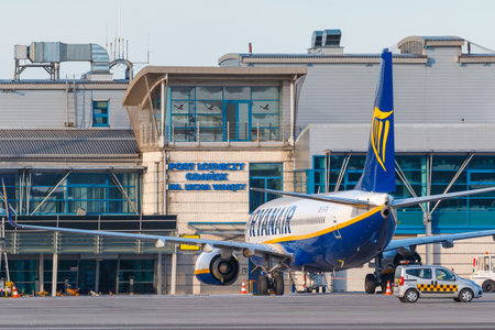 Gdansk, Poland - March 21, 2018: Gdansk, Poland - March 11, 2018: Plane line Ryanair taking off on Lech Walesa Airport in Gdansk. Sunny winter day.のeditorial素材