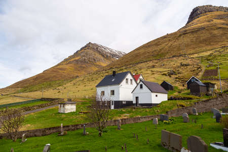 View of the Kunoy on Kalsoy island. A small village situated on the slope of a hill. Faroe Islands.の写真素材